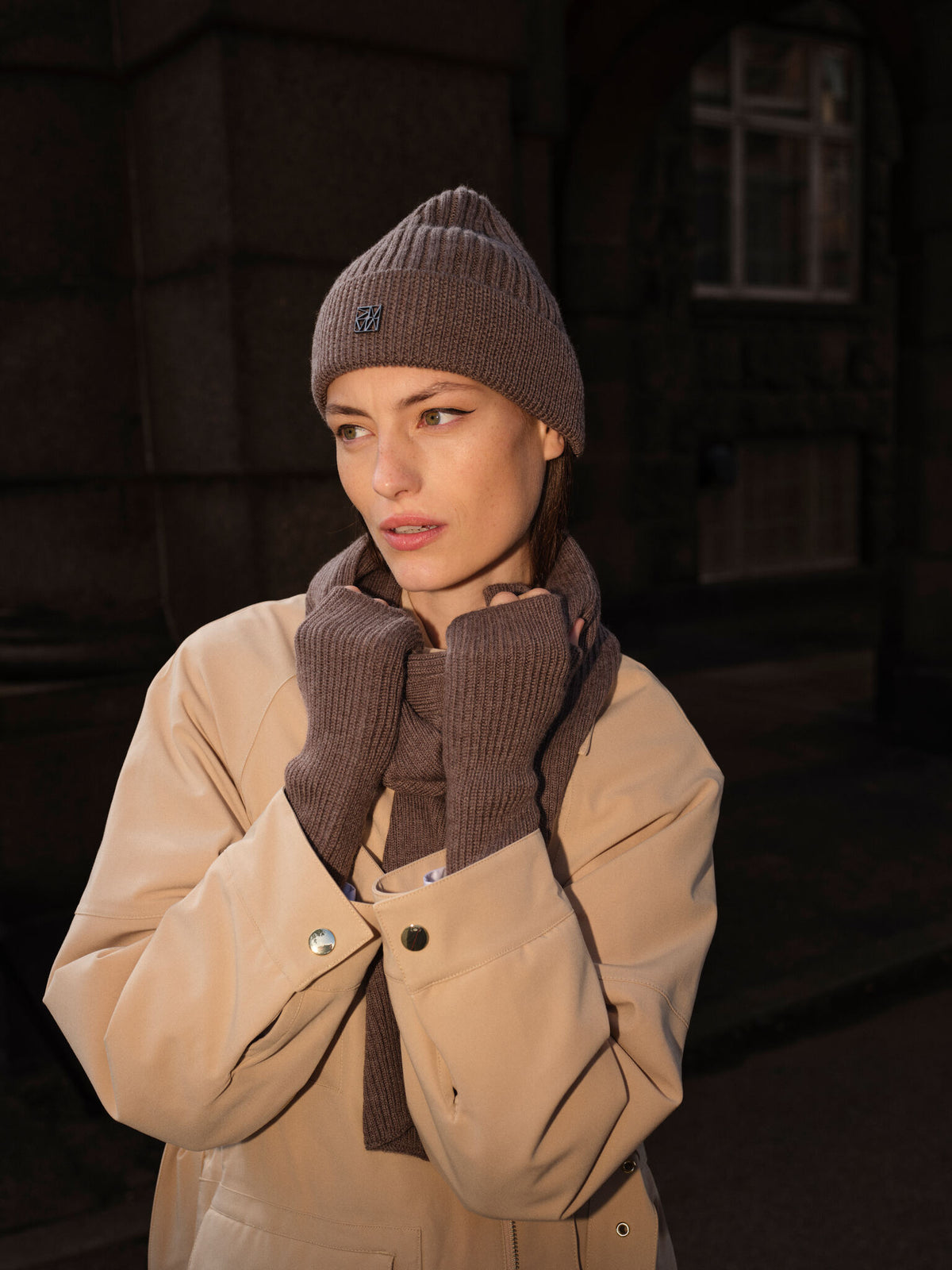 Model wears Mos Mosh Tova hat and mittens from The Shoe Gallery 