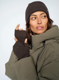 Model wears Mos Mosh Tova ribbed hat and matching mittens from The Shoe Gallery.