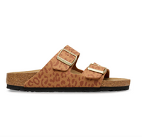 Brown leopard print Birkenstock Arizona sandal with gold buckles on a white background