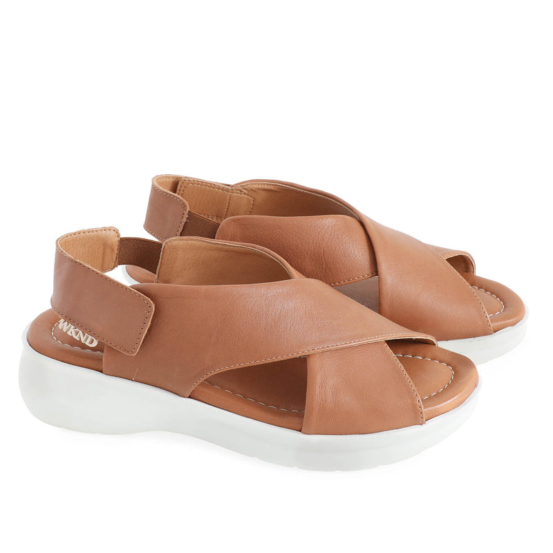 soft leather tan sandals with velcro fastening and cushioned white sole