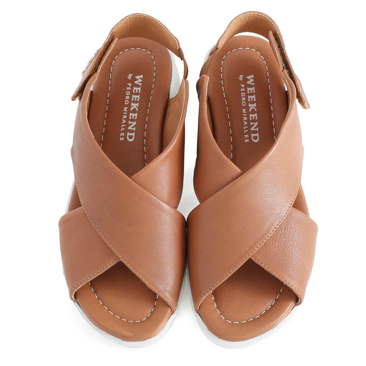 soft leather tan sandals with velcro fastening and cushioned white sole