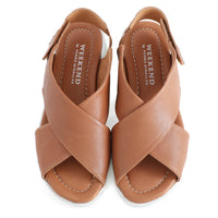 soft leather tan sandals with velcro fastening and cushioned white sole