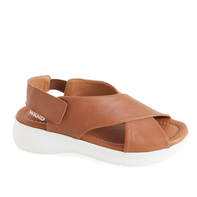 soft leather tan sandals with velcro fastening and cushioned white sole
