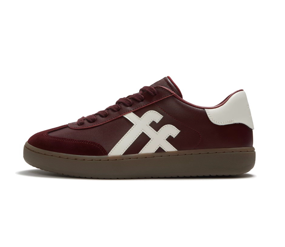 FitFlop Dash Trainer  in dark merlot leather with suede toe and cream toned fitflop branding on the side and at the heel.