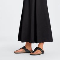 birkenstock black flower embellished Gizeh sandals with buckle closure worn by model
