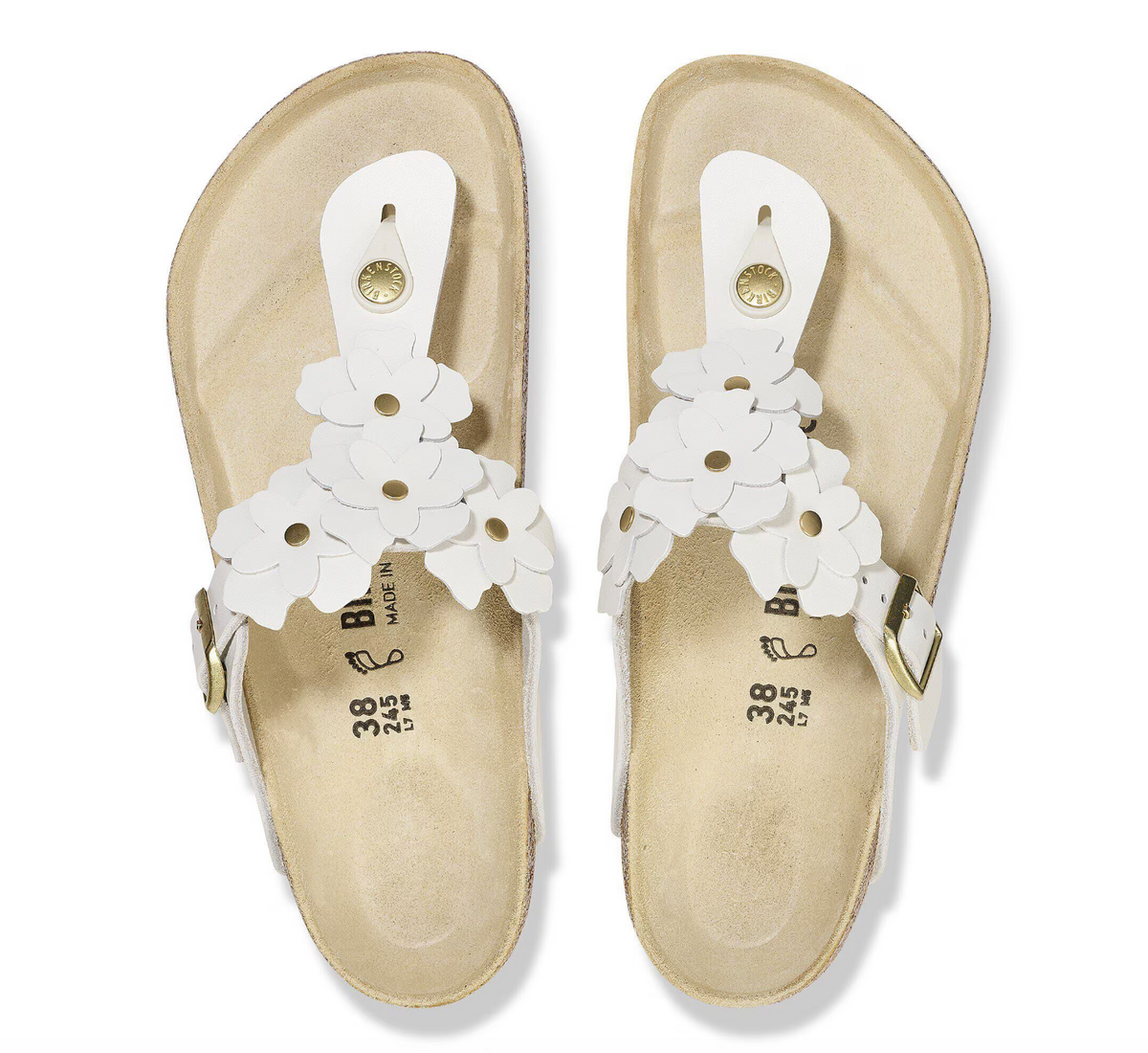 A pair of Birkenstock white leather flower embellished sandals with buckle closure