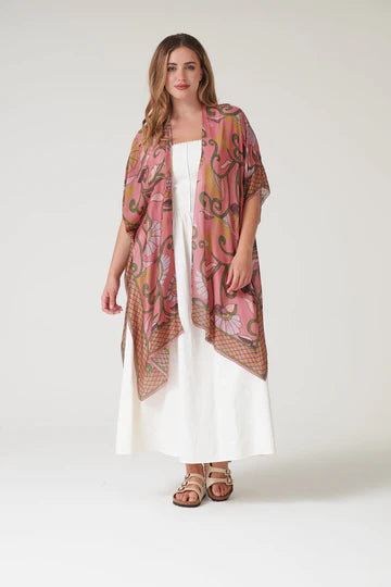 Model wears a One Hundred Stars Giant Kantha Throwover over a white summer dress