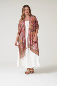 Model wears a One Hundred Stars Giant Kantha Throwover over a white summer dress