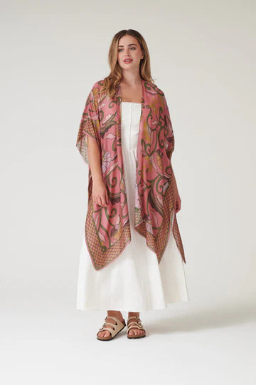 Model wears a One Hundred Stars Giant Kantha Throwover over a white summer dress