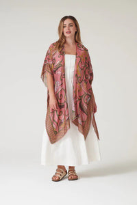 Model wears a One Hundred Stars Giant Kantha Throwover over a white summer dress