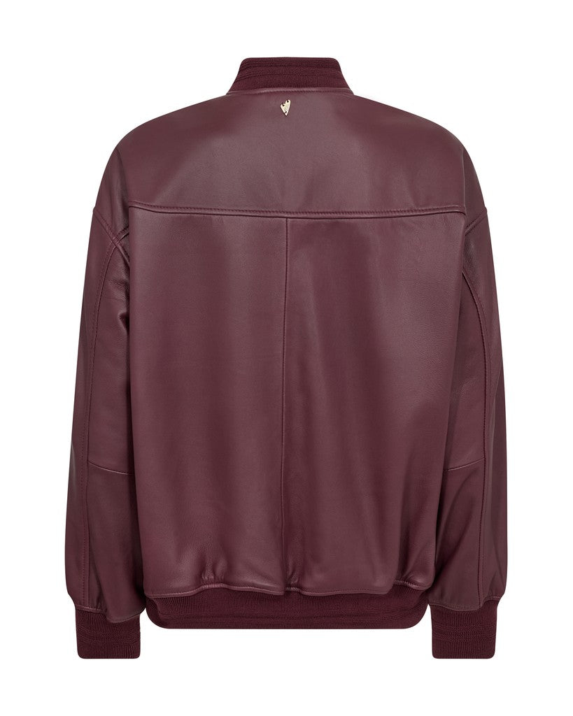 A dark burgundy leather jacket shown from the back, featuring a ribbed collar,   and ribbed cuffs and hem, set against a plain white backgroud
