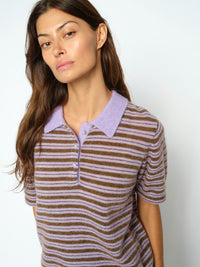 Model wears lilac and brown striped polo shirt style knit by Mos Mosh with lilac collar