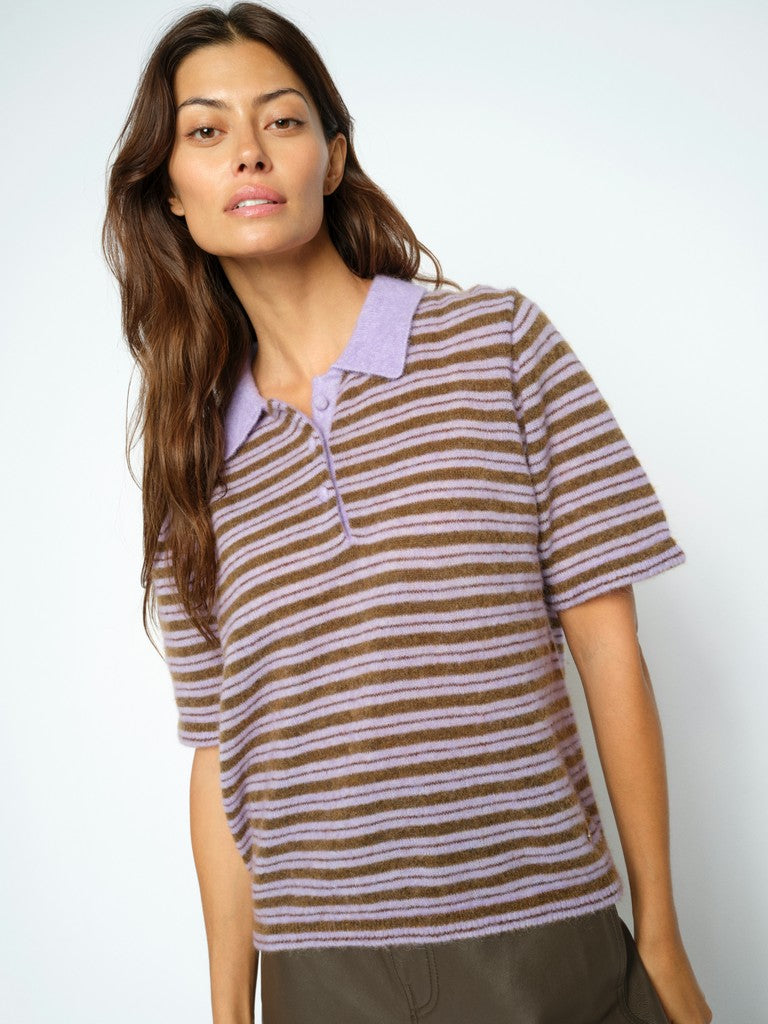 Model wears lilac and brown striped polo shirt style knit by Mos Mosh with lilac collar