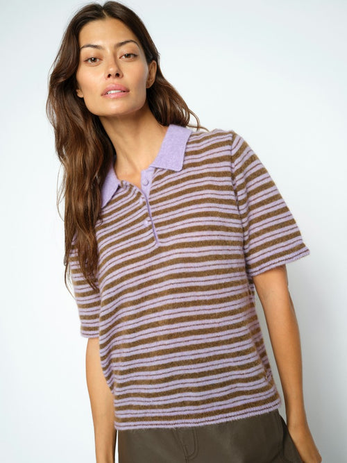 Model wears lilac and brown striped polo shirt style knit by Mos Mosh with lilac collar