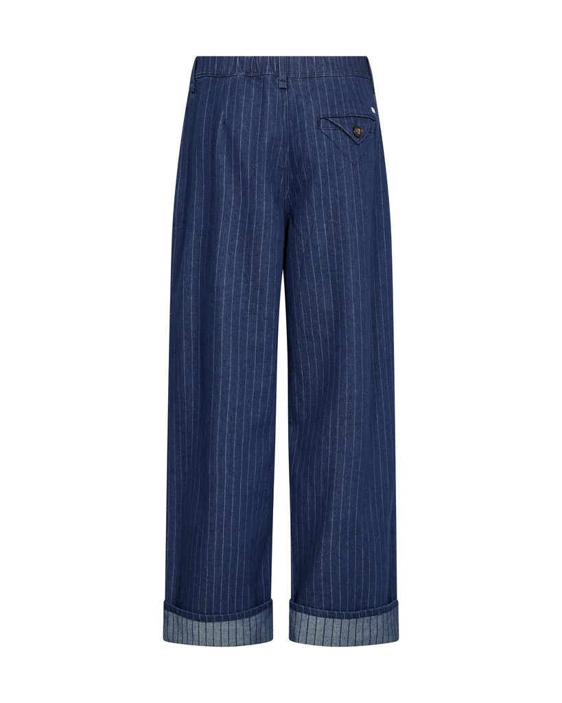 Mos Mosh wide-leg trousers in dark blue denim with thin vertical white pinstripes, featuring rolled cuffs and a single back pocket with a small metal button, shown against a plain white background.