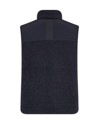 Model wears a dark navy Mos Mosh fleece vest with two way zip and zipped pocket - back view