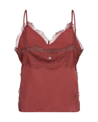 Terracotta lace-trimmed top on a white background