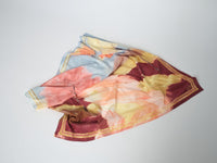 Decorative scarf by Mos Mosh with abstract floral design in the colours of the current collection, blue, vanilla and burgandy 