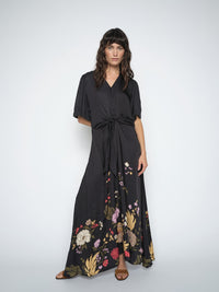 Woman wearing Black dress with floral printed hemline by Mos Mosh