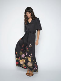 Woman wearing Black dress with floral printed hemline by Mos Mosh