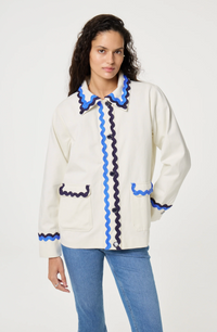 Fabienne Chapot cream Melodie jacket with double rick rack in blue and navy edging the collar, pockets, sleeves and central closure