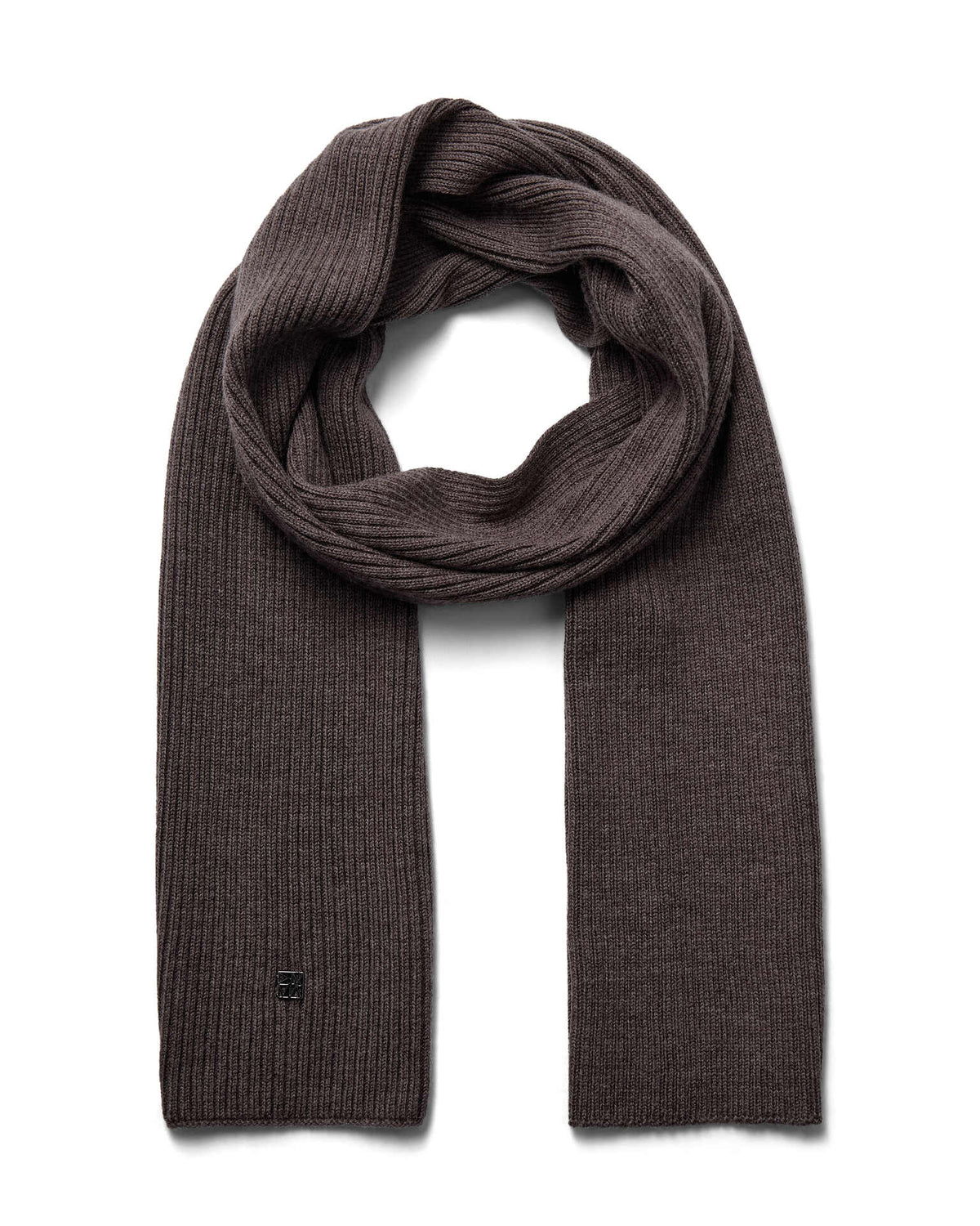 A brown toned ribbed Mos Mosh wool knit scarf, neatly folded and looped to display its texture and length, with a discreet logo on one end available at The Shoe Gallery