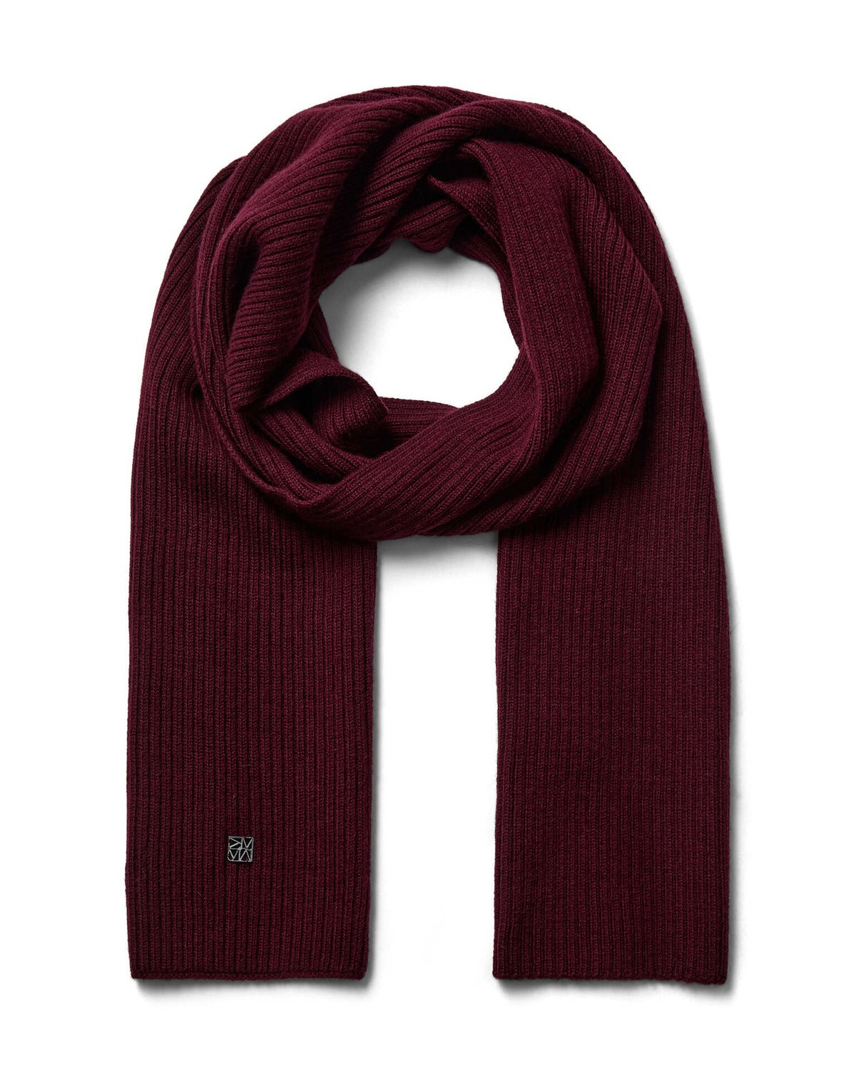 A burgandy toned ribbed Mos Mosh wool knit scarf, neatly folded and looped to display its texture and length, with a discreet logo on one end available at The Shoe Gallery