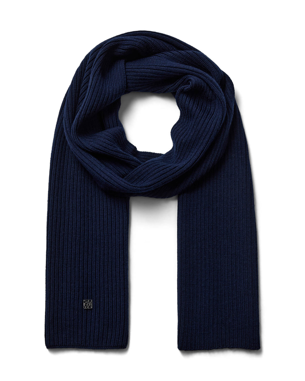 A dark navy blue ribbed Mos Mosh wool knit scarf, neatly folded and looped to display its texture and length, with a discreet logo on one end available at The Shoe Gallery