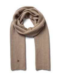 A beige toned ribbed Mos Mosh wool knit scarf, neatly folded and looped to display its texture and length, with a discreet logo on one end available at The Shoe Gallery
