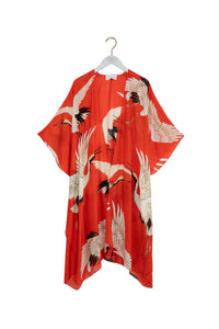 Stork Red Throwover by One Hundred Stars available at The SHOE GALLERY on a coathanger