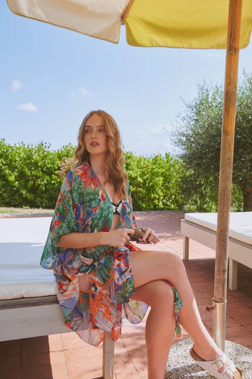 Model wears the Tropicana Blue Throwover by One Hundred Stars available at The SHOE GALLERY