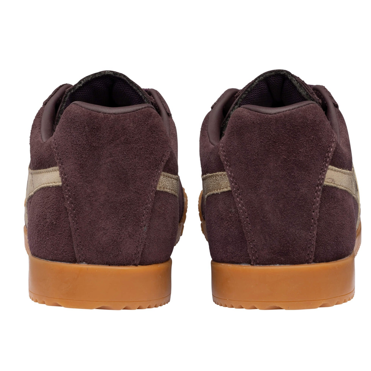 A pair of low-top Gola suede sneakers shown from the back, featuring a dark plum-brown upper with a light gold side stripe and a gum brown sole, available at The SHOE GALLERY
