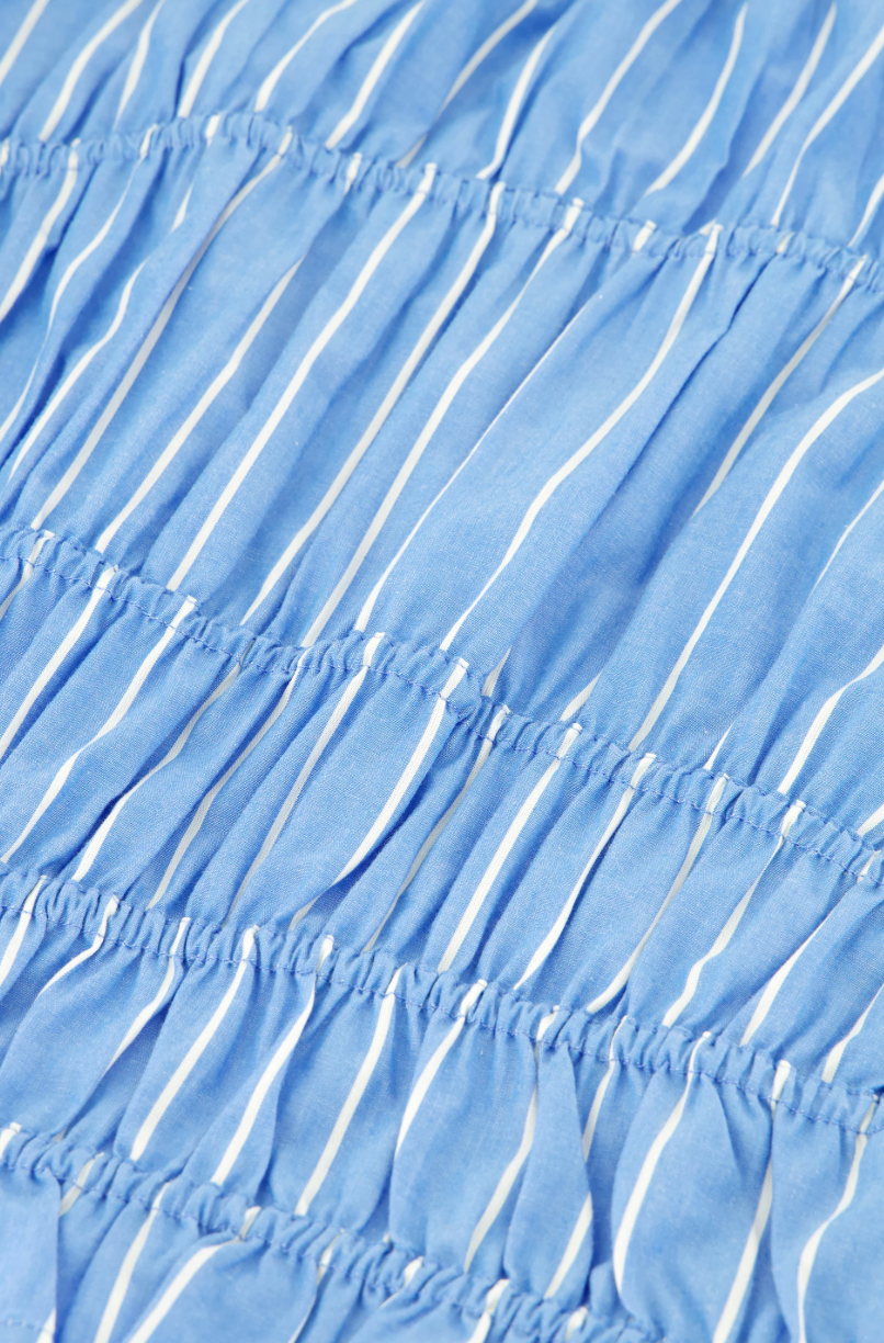 close up of blue ruched top by Fabienne Chapot