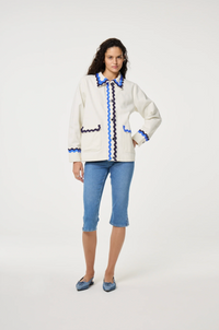 Fabienne Chapot cream Melodie jacket with double rick rack in blue and navy edging the collar, pockets, sleeves and central closure