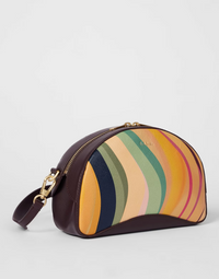 A Paul Smith dusky swirl  striped bag in a camera bag style. Centre gold coloured zip and deep burgundy across body strap, available at The Shoe  Gallery