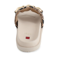 Beige Hogl sandals with snake print and gold chain detail on a white background